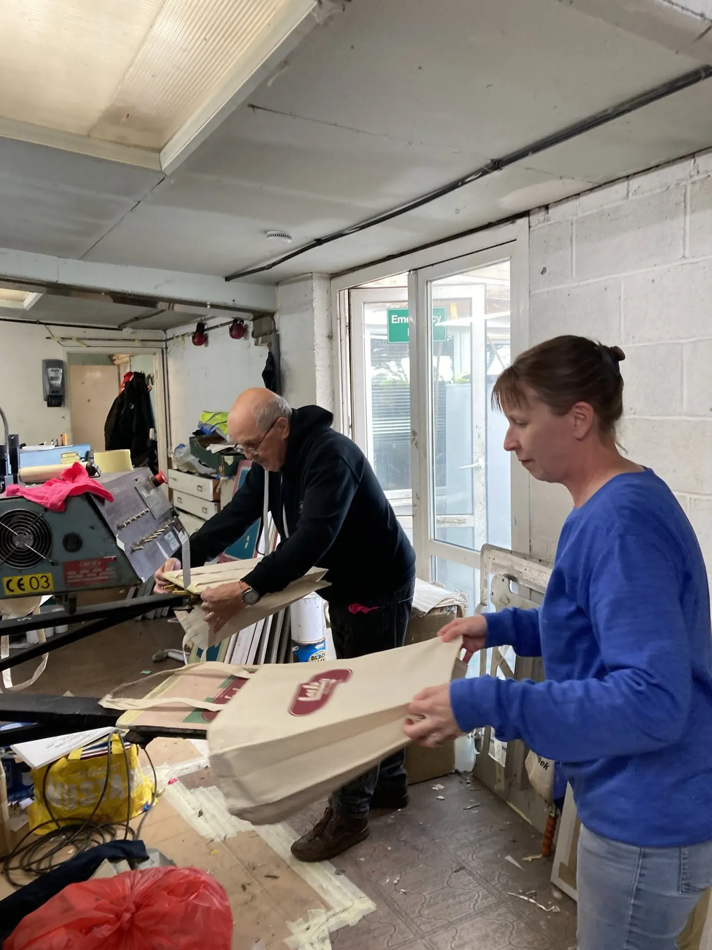 Screen printing bags in the Devon Shirts workshop